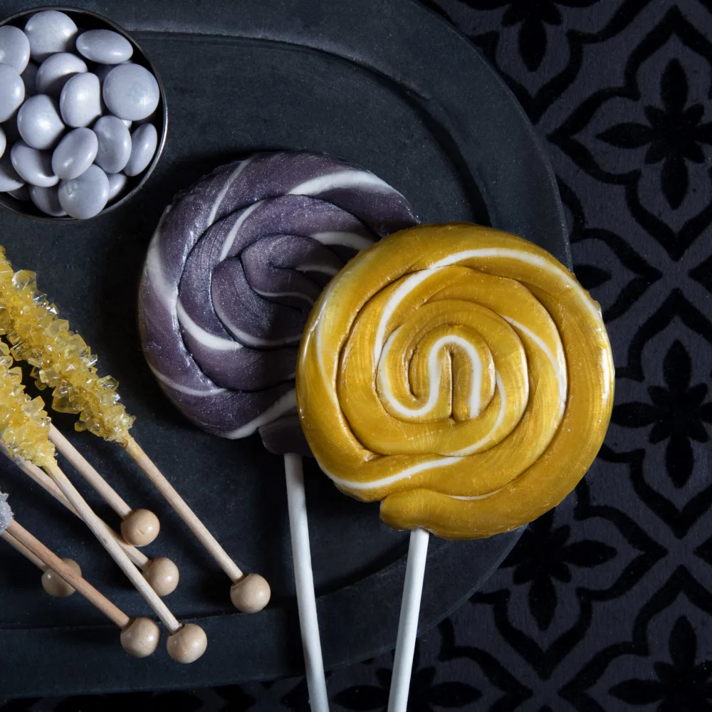 Silver and gold Whirly Pops oversized lollipops
